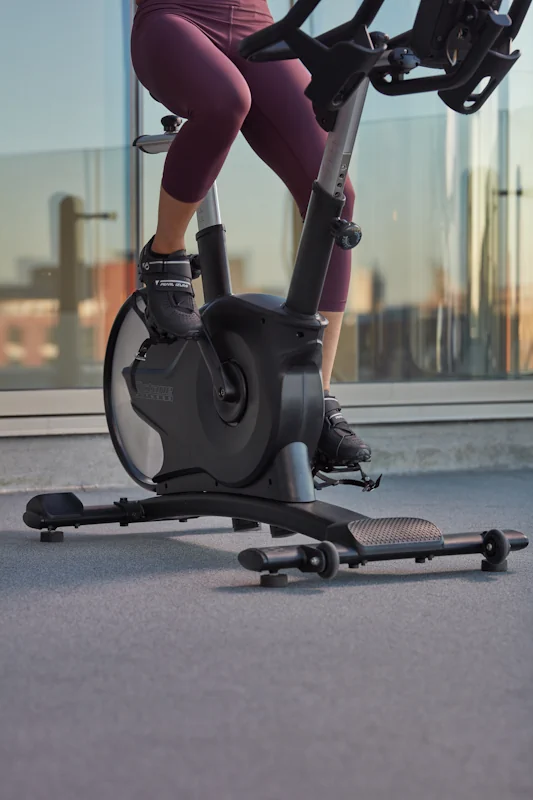 Woman using exercise bike